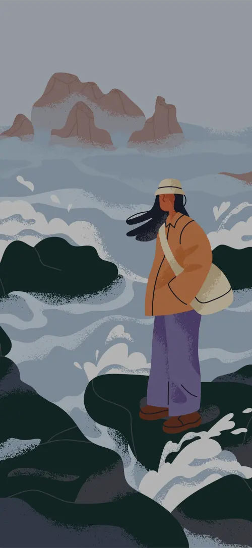 Person standing by strong ocean waves