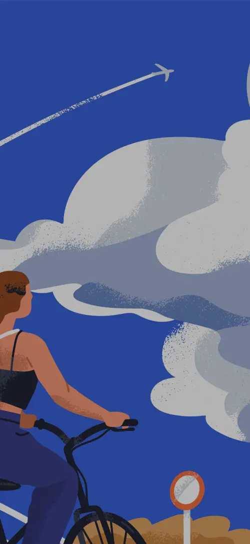 Person biking while looking at open sky